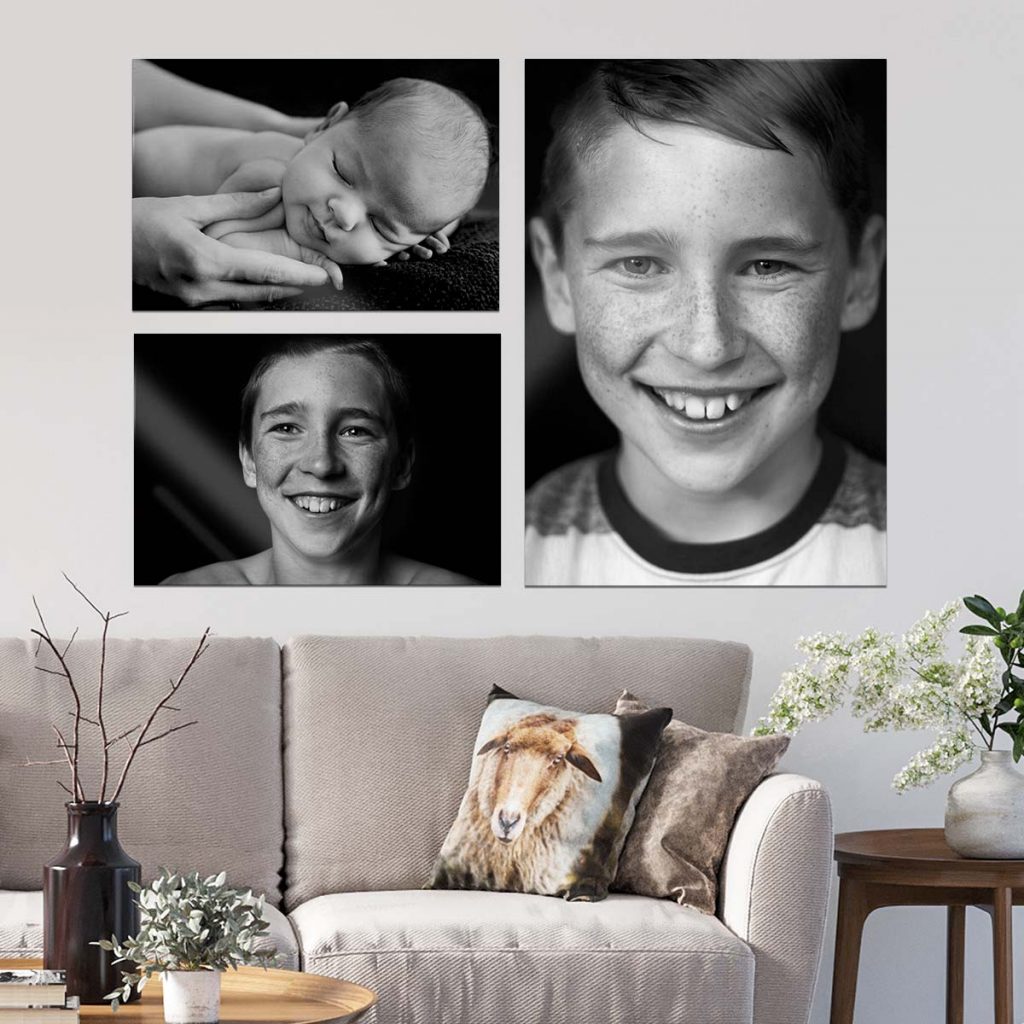 3 xwart-wit portretfoto's van kinderen boven een bank
