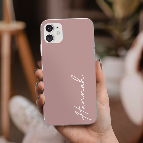 Roze telefoonhoesje met witte naam